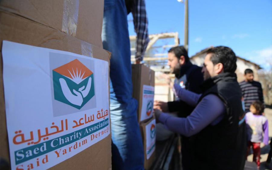 جمعية تركية توزع مساعدات غذائية على اللاجئين السوريين